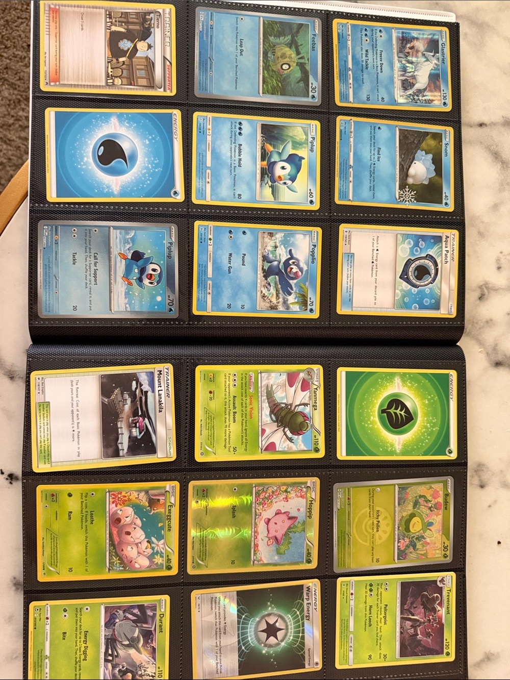 Pokemon card Binder pages with Blue, Green & Yellow Cards